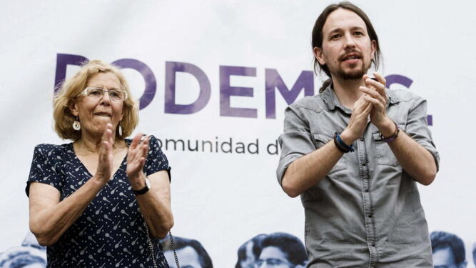 La alcaldesa de Madrid, Manuela Carmena, y el líder de Podemos, Pablo Iglesias.