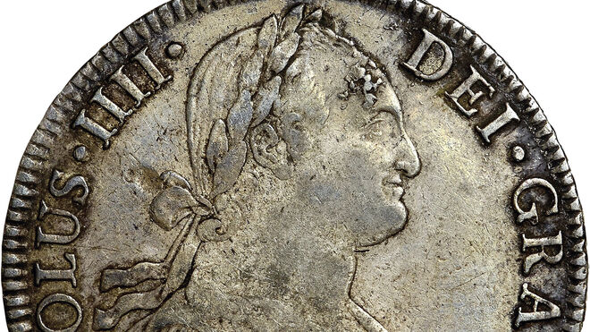 Imagen de una moneda española de la época.  Los reales de a ocho españoles fueron la primera gran moneda de uso global, igual que el dólar estadounidense lo fue a partir de la segunda mitad del siglo XX.