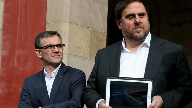El exsecretario general de Economía del Gobierno catalán, Josep Maria Jové Lladó (i) junto a Oriol Junqueras