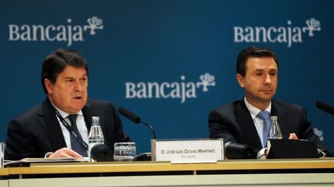 José Luis Olivas, expresidente de Bancaja, y Aurelio Izquierdo, ex director general de la caja.