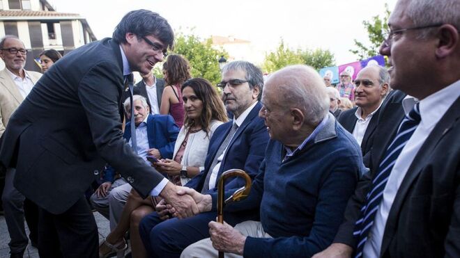 Carles Puigdemont junto a Jordi Pujol