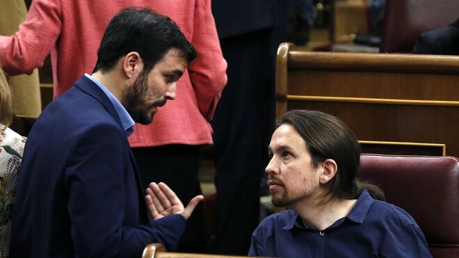 Alberto Garzón y Pablo Iglesias, líderes de IU y Podemos respectivamente