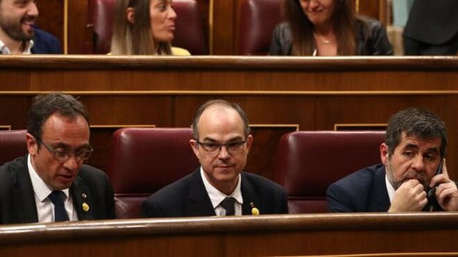 Jordi Sánchez, Turull y Rull, durante el pleno.