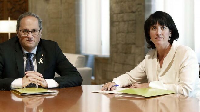 El presidente de la Generalitat, Quim Torra, junto a la presidenta de la ANC, Elisenda Paluzie.