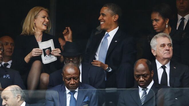 Michelle Obama, enfadada, por la actitud de su marido con Helle Thorning-Schmidt.
