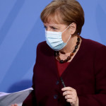 Merkel ve "notables problemas legales" para prohibir vacaciones en extranjero