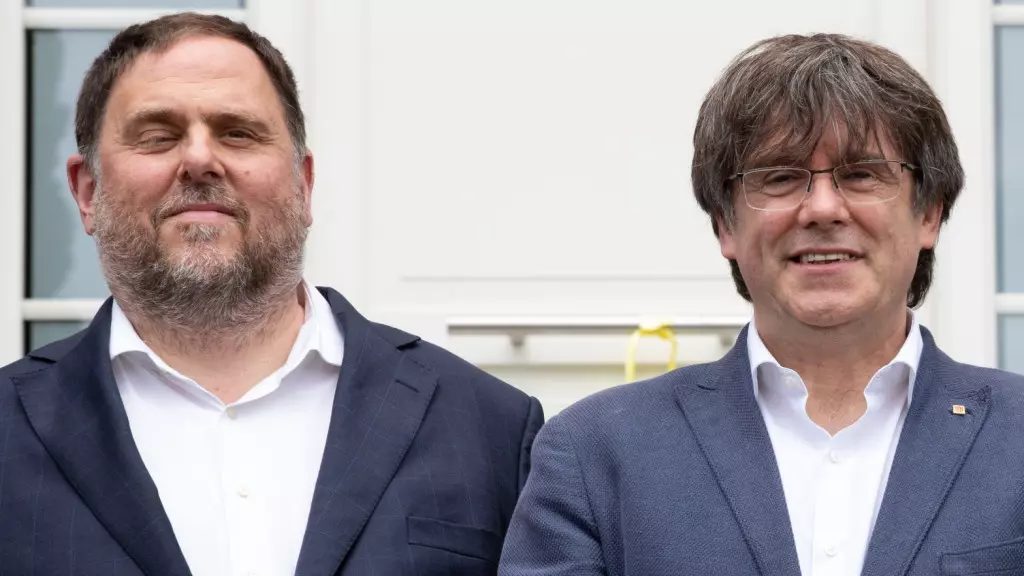 Oriol Junqueras y Carles Puigdemont