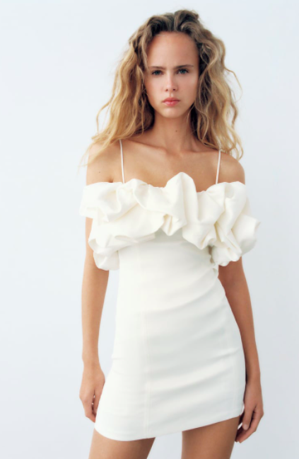 Los vestidos blancos que arrasan en Zara, Stradivarius, H&M