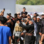 Milicias chiítas en las manifestaciones que han sumido Bagdad en el caos