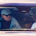 El rey emérito Juan Carlos I, en el vehículo que conduce su amigo Pedro Campos (d), a su salida del