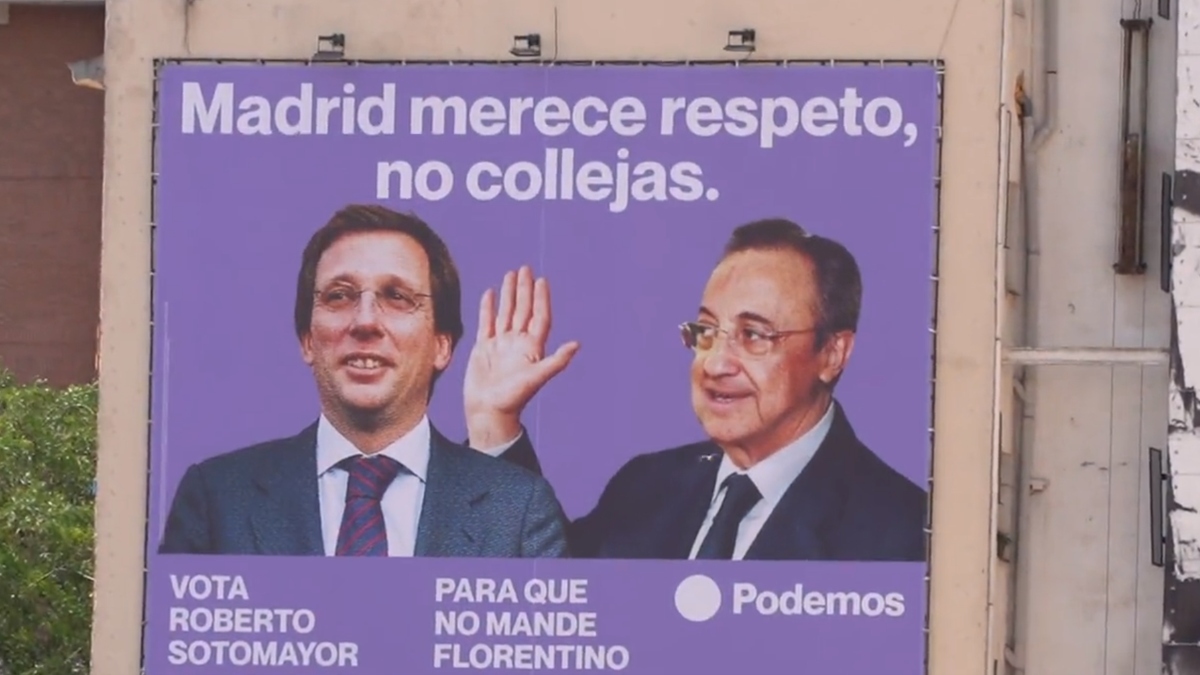 Podemos cuelga en Madrid una lona ilustrada con la colleja de Florentino Pérez a José Luis Martínez-Almeida