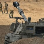 Solados y carros de combate israelíes.