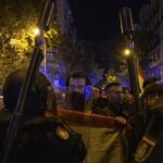 Agentes 'antidisturbios' en las inmediaciones de la calle Ferraz, durante las protestas contra la amnistía